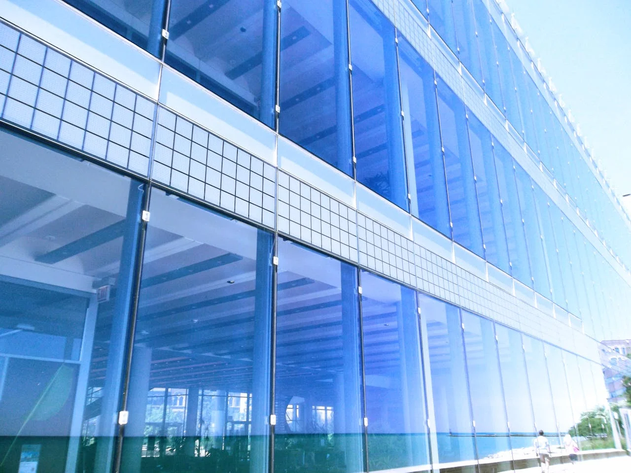 Illustrative glazed commercial building; not a named customer property